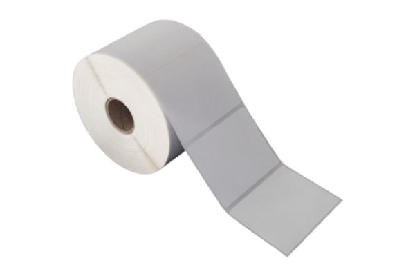 Workspace modern percetakan Nexora dengan peralatan desain dan cetak profesional